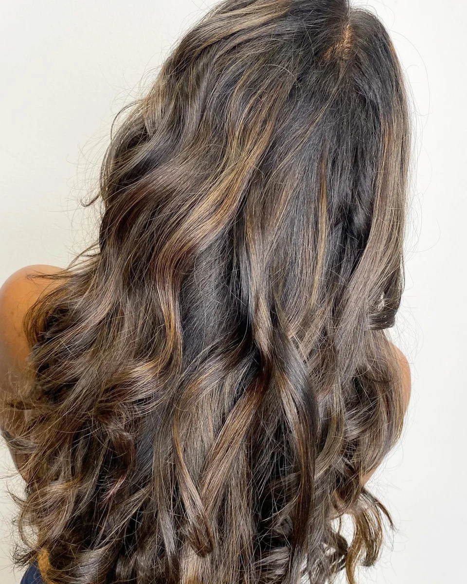 Long dimensional brunette curls with caramel ribbons