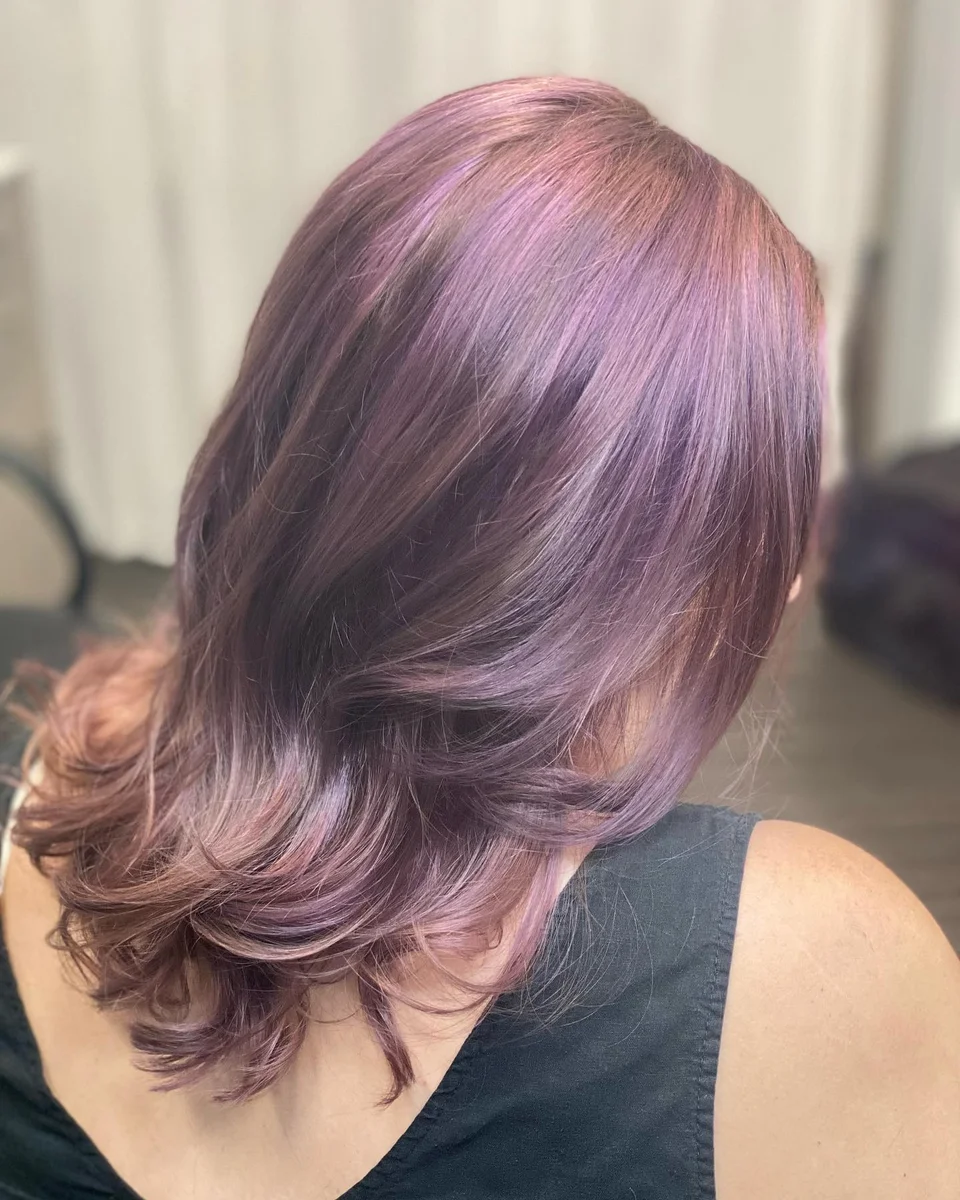 Layered mauve-brown hair with a smooth finish