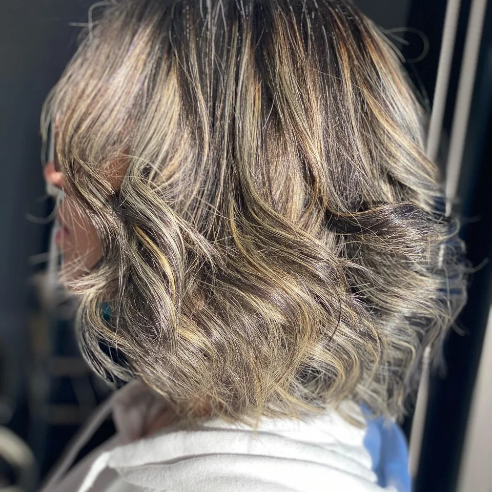 Short brunette bob with dimensional highlights