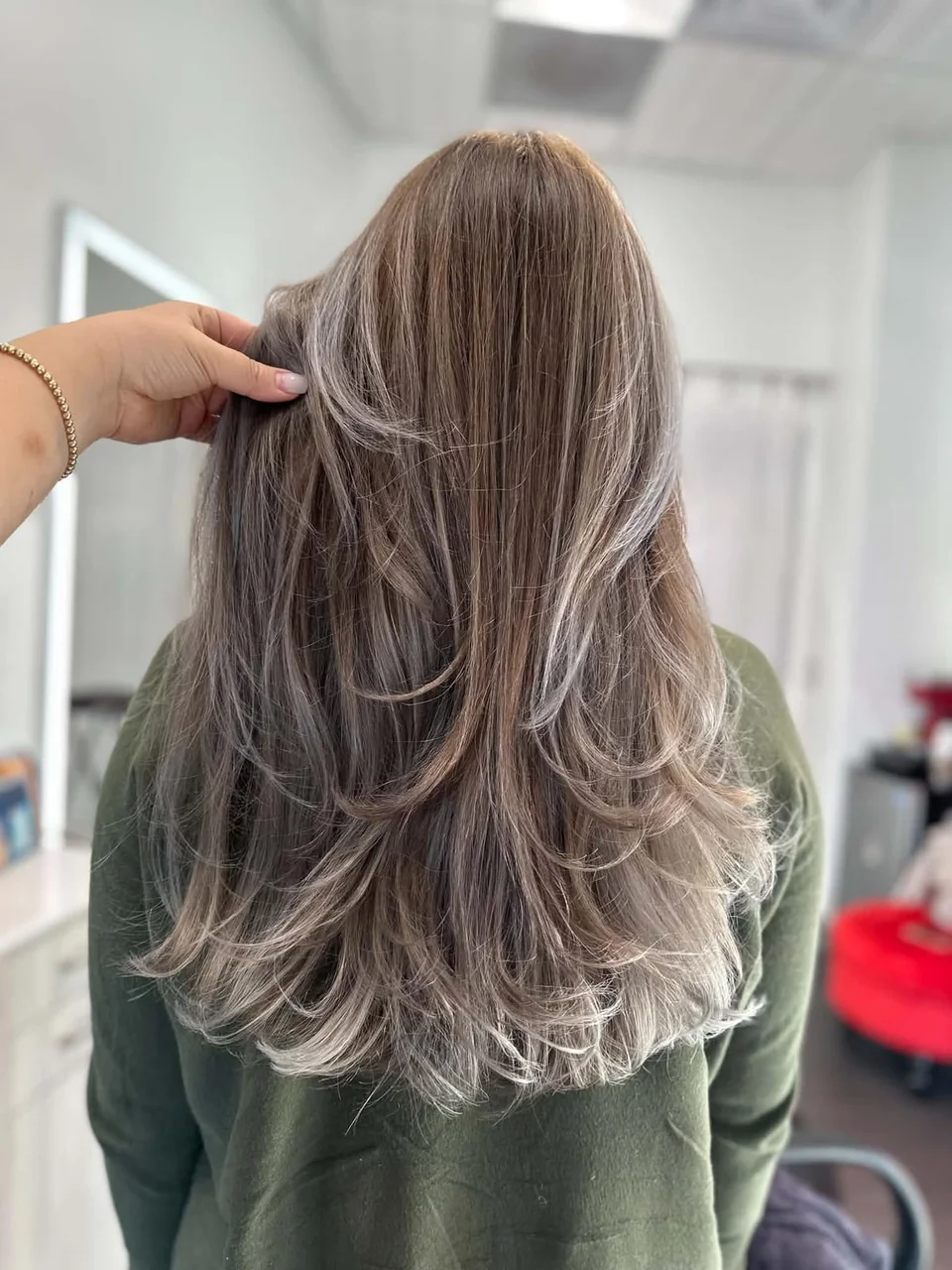 Long ash brunette hair with pale dimensional layers