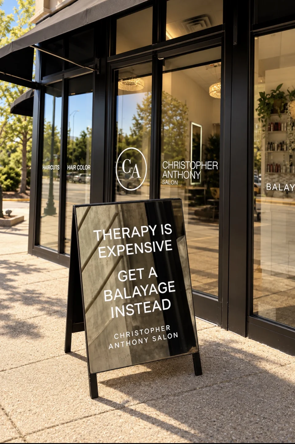Christopher Anthony Salon storefront and sidewalk sign